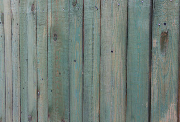 Obraz premium Old wooden fence with shabby blue paint. Background for text, cards and arts.