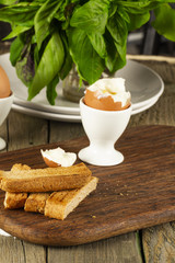 Scrambled eggs with herbs on wheat-rye crispy bread, homemade