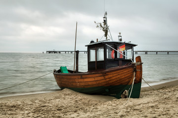 Naklejka na ściany i meble Old and typical fishing boat