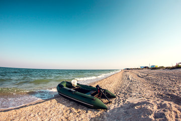 Fototapeta na wymiar Inflatable boat on the beach.
