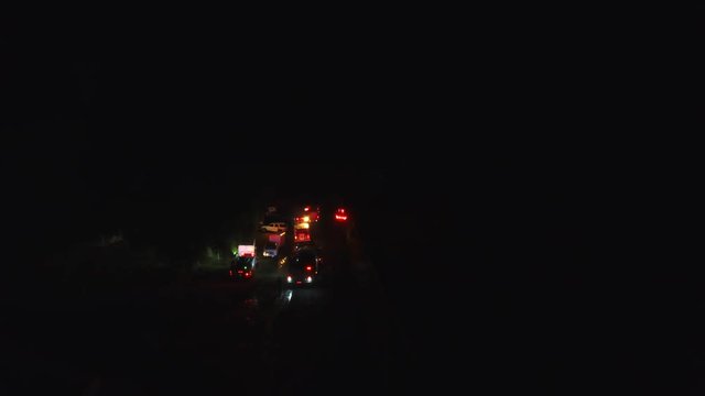 Backing up a firetruck at night.