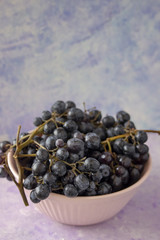 Black grapes in a bowl