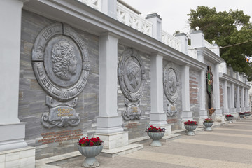 Marble high reliefs of historical figures significant for the city on the memorial wall in honor of the 2500th anniversary of the city of Evpatoria, Crimea, Russia