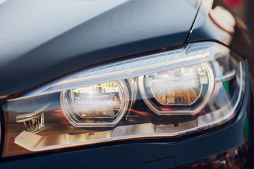 Obraz na płótnie Canvas Detail beauty and fast car with headlight
