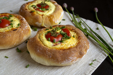 Homemade country cake with cheese and tomatoes.