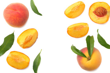 peach fruit with green leaf and slices isolated on white background. top view