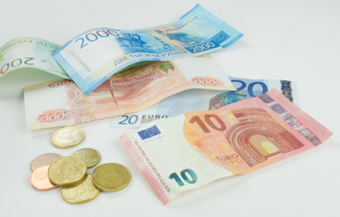 International currencies background. Money from different countries: dollars, euros, rubles.