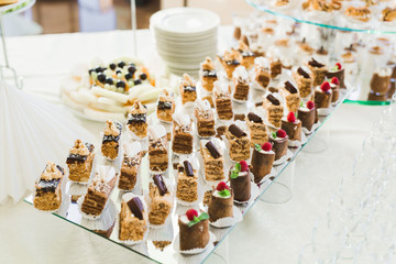 Different kinds of baked sweets on a buffet