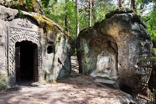 Man made cave Klacelka with sandstone sculptures created by Vaclav Levy in 1840s	between Libechov and Zelizy, Czech Republic