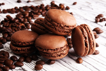 Sweet and colourful french macaroons or macaron with coffee