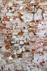 Texture of broken red brick wall