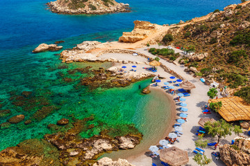 Sea skyview landscape photo of picturesque beach near Stegna and Archangelos on Rhodes island, Dodecanese, Greece. Panorama with sand and clear blue water. Famous tourist destination in South Europe © oleg_p_100