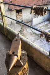 Anvil and horseshoes on an altarpiece in the neighborhood of Parelheiros, south zone of Sao Paulo, SP.