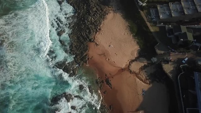 This is the east coast coastline of South Africa. A small beach town called Ballito.