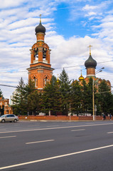 View of the Savior Transfiguration Church in Tushino from the Volokolamsk highway in a tranquil summer evening. Moscow. Russia.