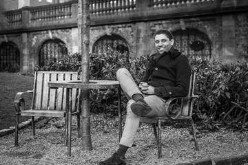 Man sitting on a chair in a park