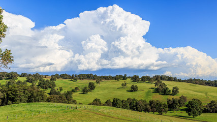 Fototapeta na wymiar Stormy clouds over farmland