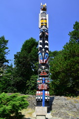 First Nations totem pole on the grounds of Government House in Victoria BC,Canada.