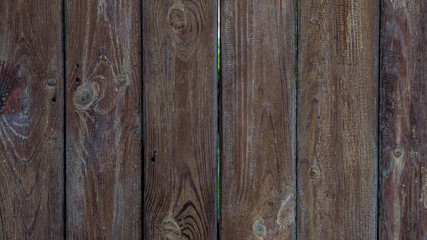 Multicolored wooden wall and blue sky. A colored wall of wood with a lot of copy space. Wooden...