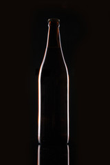 beer bottle closeup on the black