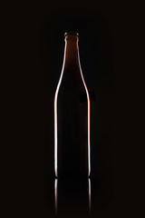 beer bottle closeup on the black