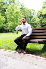 Man With Beard Smoking the Cigar