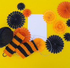 The process of knitting gaiters on a Halloween holiday. Witch costume.