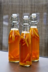 kombucha drink bottles homemade with fresh mango fermentation probiotic