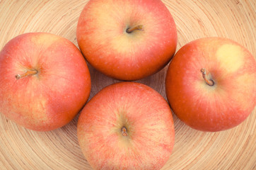Fresh ripe apples on wooden background, healthy fruits