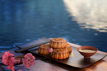Moon cake on the red background,Asian traditional festival, Mid-Autumn festival.Chinese traditional festival.