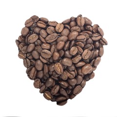 Pile Of Coffee Beans In Heart Shape On White Background.