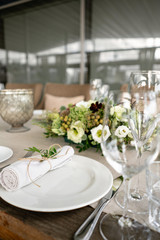Neatly twisted into a tube dining room napkin decorated with a sprig of pistachio. Wedding Banquet...
