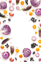 Composition frame of vegetables and fruits isolated on a white background. Collage of red cabbage in a cut, eggplants, plums, grapes, mandarins.