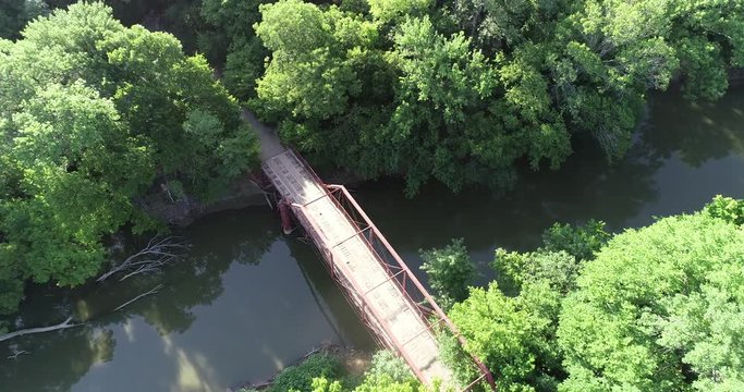Aerial video of the Old Alton Bridge in Argyle Texas. This bridge is famous as a local haunted area with the legend of the goat man.