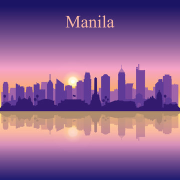 Manila city silhouette on sunset background