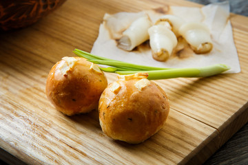 macro view baked doughnut with garlic topping  and sliced tallow