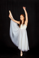 Naklejka premium Ballerina learns to dance