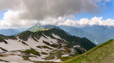 View of the snowy peaks of Rosa Peak. The Caucasus. Krasnaya Polyana, Sochi, Krasnodar Krai, Russia. 