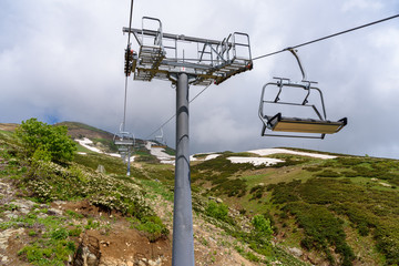 Ski lifts leading to the top of the mountain. The Caucasus. Krasnaya Polyana, Sochi, Krasnodar Krai, Russia. 
