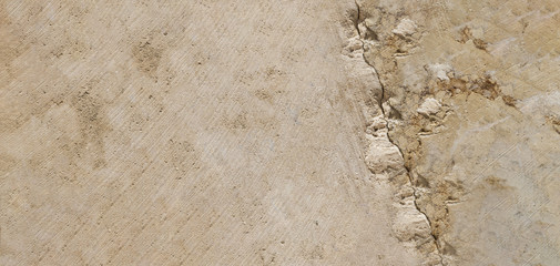 yellow stone surface texture with crack. Sea cliff limestone