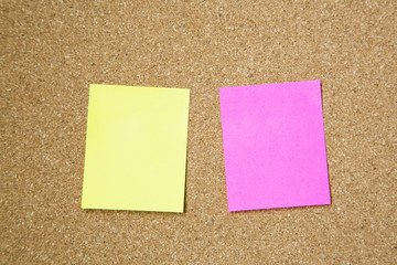 collection of colorful post it two sheets. paper note pad reminder sticky notes on cork bulletin...