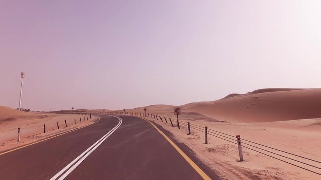 New road from Oasis Liwa to Moreeb Dune in Rub al Khali desert stock footage video