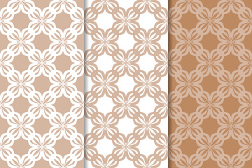Brown floral backgrounds. Set of seamless patterns