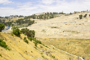 A view across the Kidron Valley to the Mount of Olives in Jerusalem from the steps to Hezekiah's Tunnel in the city of Jerusalem in Israel