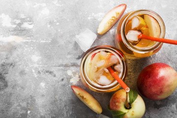 Peach ice tea on a gray background. Top view, copy space. Food background