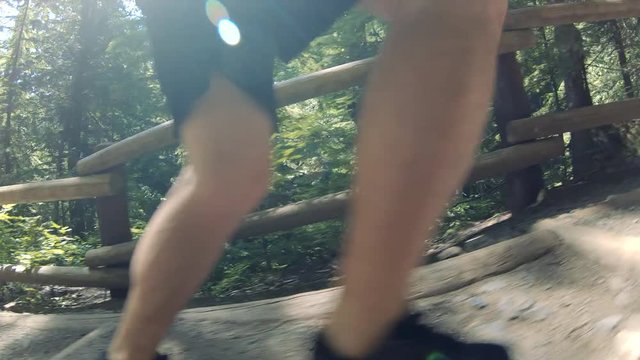 Knee and Legs Close Up Jogging in Nature Slow Motion
