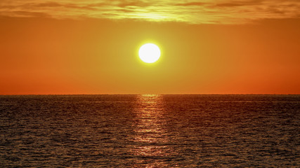 Sun Risr Over The Sea