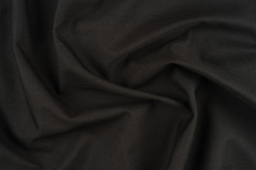 Fototapeta premium Textile and texture concept - close up of crumpled fabric background. Abstract background, empty template.