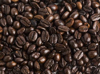 Roasted coffee beans isolated on pure white background for content using.