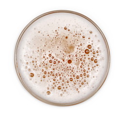 Glass of beer with bubble isolated on white, top view